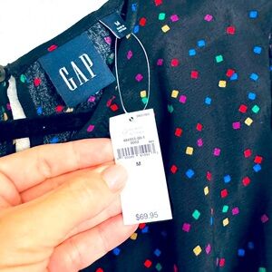NWT! Gap long sleeve stylish top! Cut-out sides!